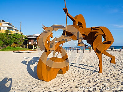 `St george and the dragon` is a sculptural artwork by Jimmy Rix at the Sculpture by the Sea annual events free to the public. Editorial Stock Photo